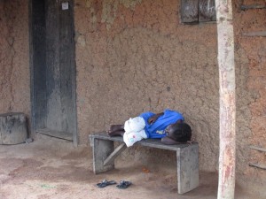 This child has probably died by now.  When I took this picture, her mother had previously been taken to an Ebola treatment unit, and the child became ill some days later.  Taken in Masokory, Sierra Leone November, 2014.