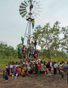 The team and village celebrate the successful construction of the windmill